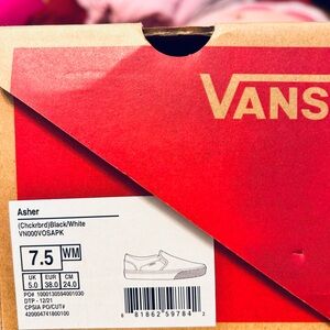 Vans Asher Black and White Slip-On Sneakers